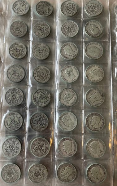 MYNT: samling Oscar och Gustav V i fyra pärmar.