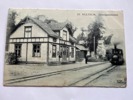 Järnvägs-stationen ST Hultrum, med lok och stins.