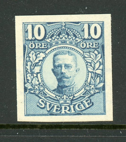 F76P Färgprov i gråblå färg, delar av två kronor.